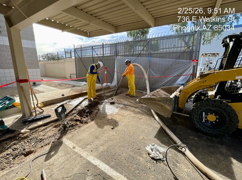 Father and Son Masonry crew performing hydro vacuuming at T-Mobile Data Center in Phoenix AZ